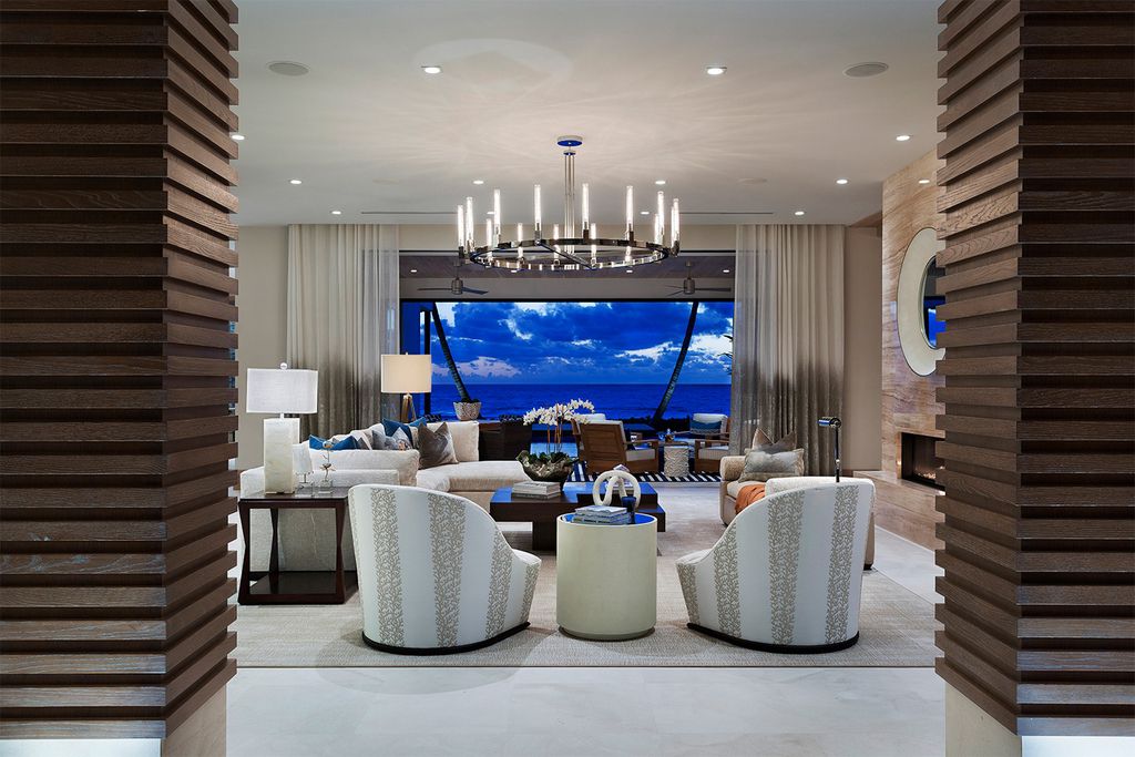 This Oceanfront Home in Florida was built and designed by Mark Timothy Luxury Homes to the creativity of award-winning Affiniti Architects. Direct beachfront on the Atlantic Ocean & Intracoastal Waterway, the villa offers a private yacht dock