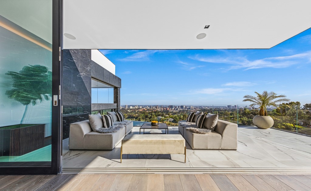 The Bel Air Mansion is an architectural masterpiece sits at the top of a promontory has arguably the greatest views of Los Angeles now available for sale. This home located at 777 Sarbonne Rd, Los Angeles, California