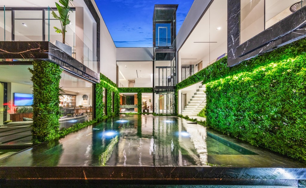 The Bel Air Mansion is an architectural masterpiece sits at the top of a promontory has arguably the greatest views of Los Angeles now available for sale. This home located at 777 Sarbonne Rd, Los Angeles, California