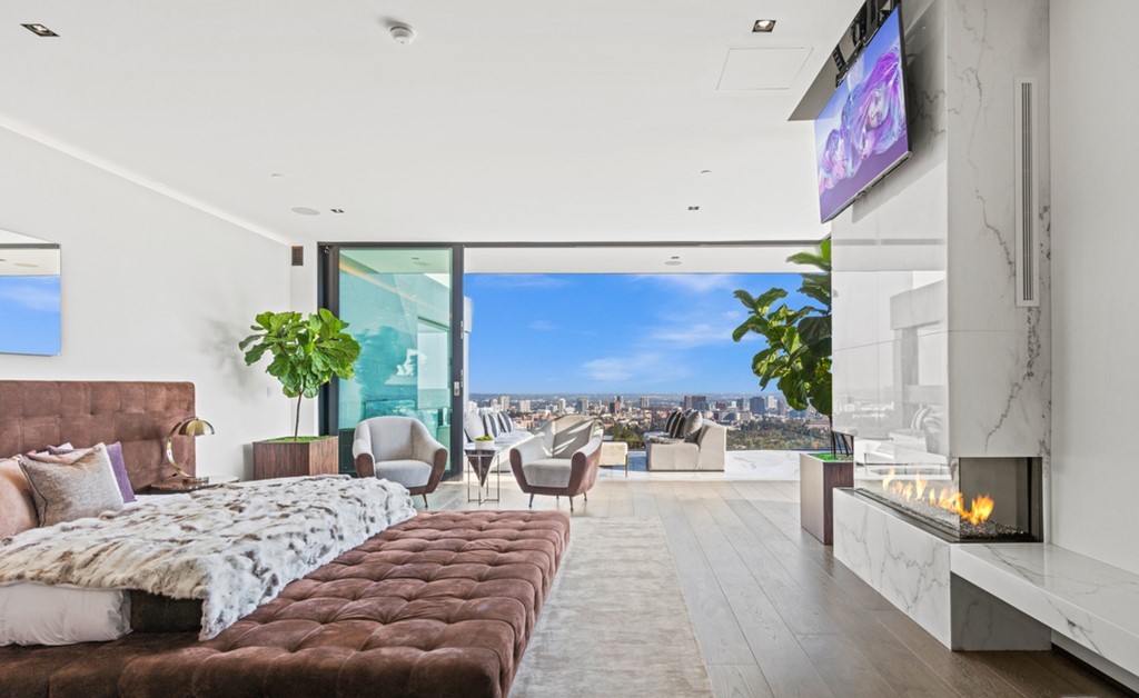 The Bel Air Mansion is an architectural masterpiece sits at the top of a promontory has arguably the greatest views of Los Angeles now available for sale. This home located at 777 Sarbonne Rd, Los Angeles, California