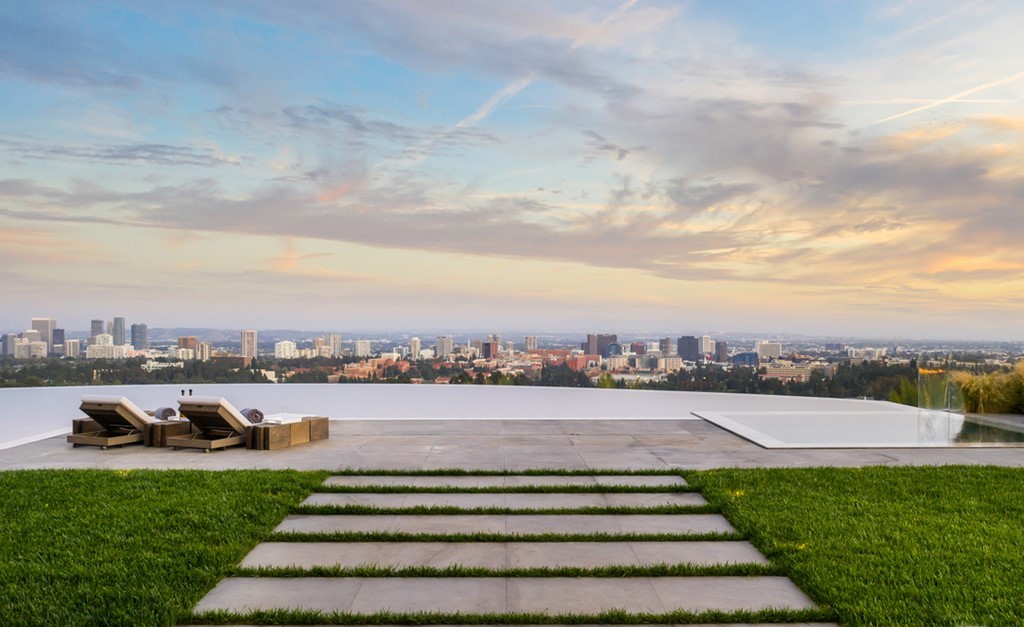 The Bel Air Mansion is an architectural masterpiece sits at the top of a promontory has arguably the greatest views of Los Angeles now available for sale. This home located at 777 Sarbonne Rd, Los Angeles, California