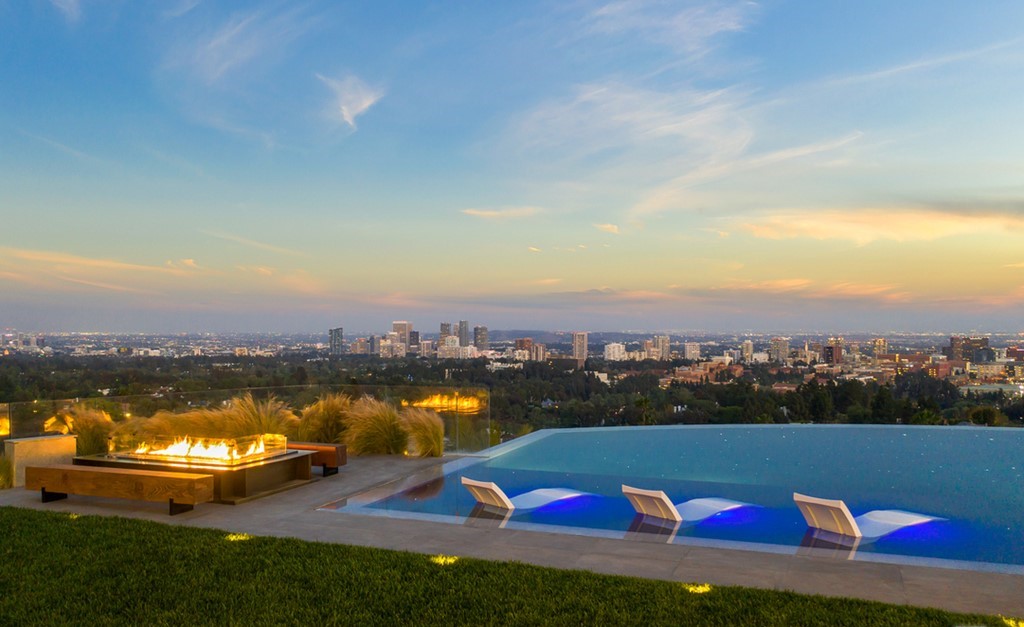 The Bel Air Mansion is an architectural masterpiece sits at the top of a promontory has arguably the greatest views of Los Angeles now available for sale. This home located at 777 Sarbonne Rd, Los Angeles, California