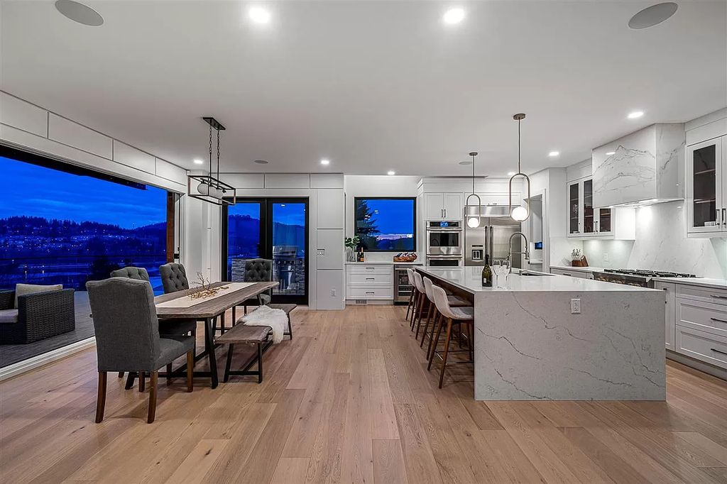 The Breathtaking Sunset House in Port Moody is an exquisite modern luxury home now available for sale. This home located at 168 Roe Dr, Pt Moody, BC V3H 3M8, Canada