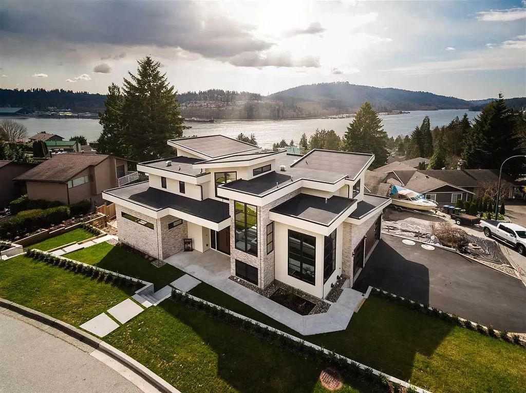 The Breathtaking Sunset House in Port Moody is an exquisite modern luxury home now available for sale. This home located at 168 Roe Dr, Pt Moody, BC V3H 3M8, Canada