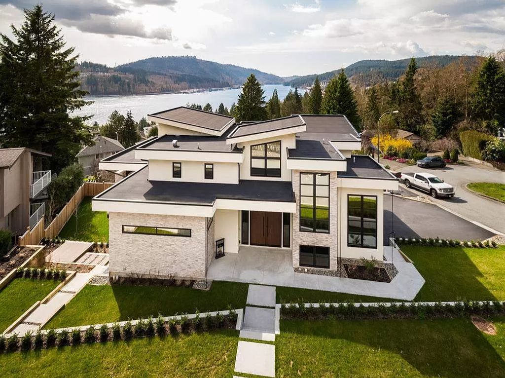 The Breathtaking Sunset House in Port Moody is an exquisite modern luxury home now available for sale. This home located at 168 Roe Dr, Pt Moody, BC V3H 3M8, Canada