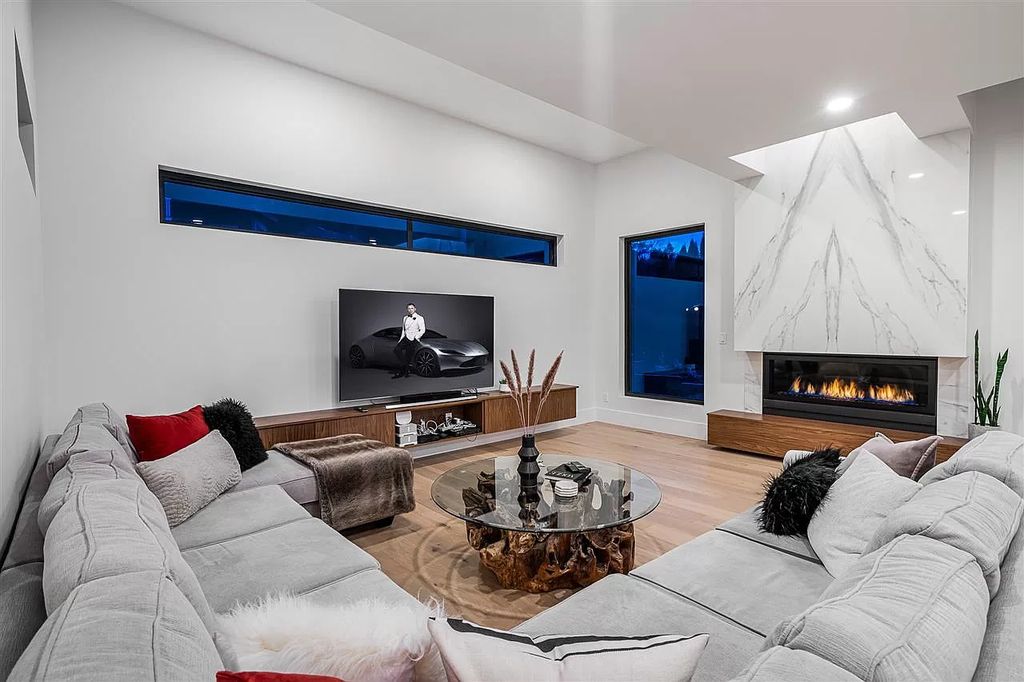 The Breathtaking Sunset House in Port Moody is an exquisite modern luxury home now available for sale. This home located at 168 Roe Dr, Pt Moody, BC V3H 3M8, Canada