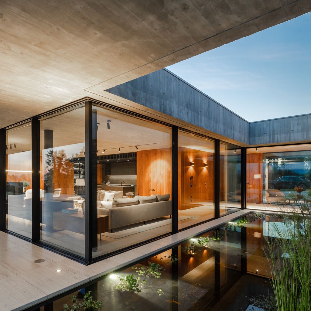 Cork-Trees-House-by-Trama-Arquitetos-a-Raw-concrete-floats-over-Horizon-27