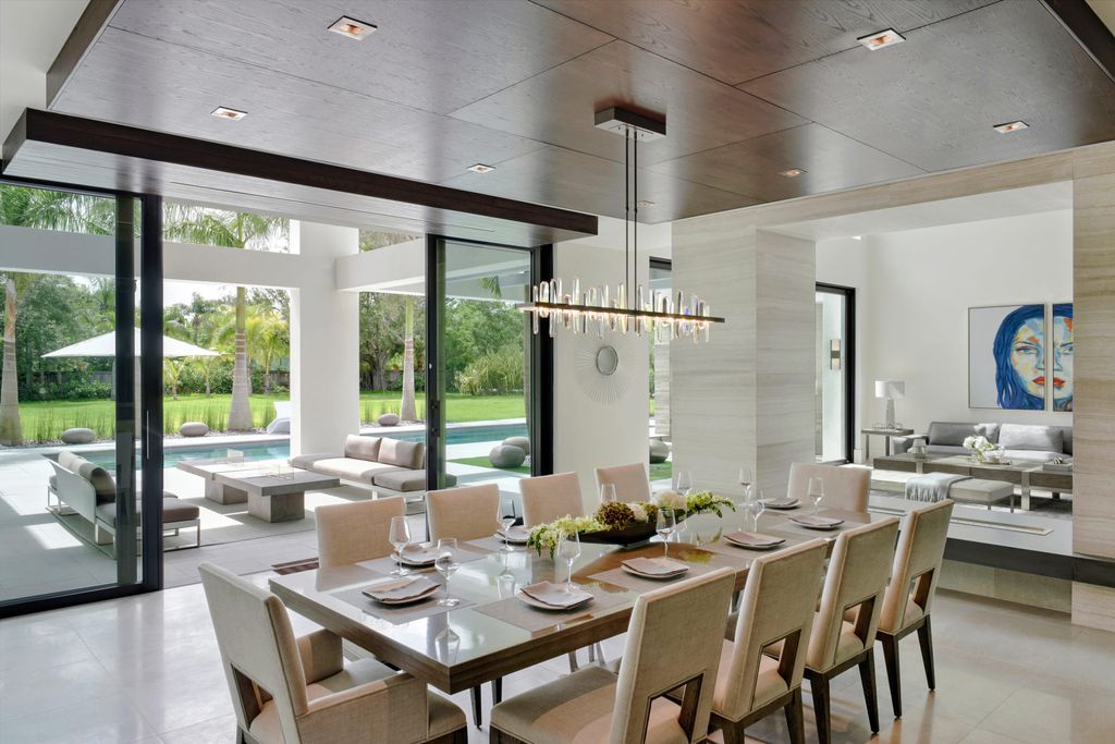 This Pinecrest Modern Estate in Florida, United States was executed by prestigious Hollub Homes. This home is located on a 50,530 sq ft lot to accommodate a N-S tennis court. Experience the ultimate in modern luxury, legendary quality and design