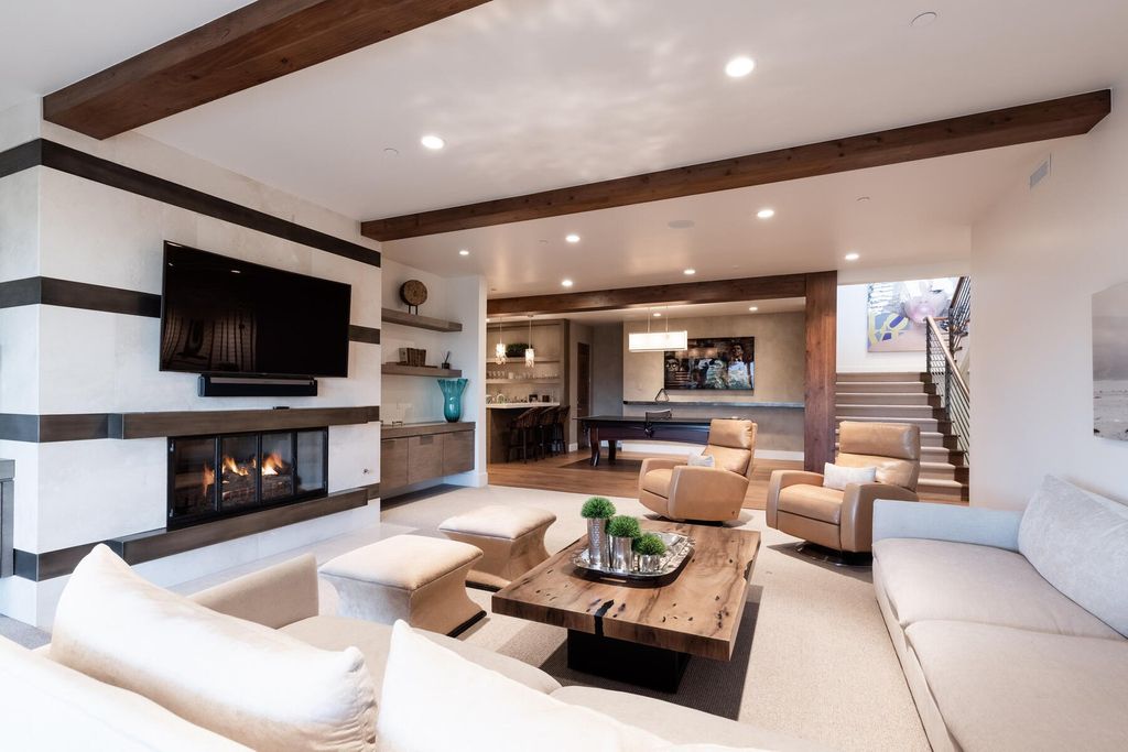 The Utah Home is an exquisite mountain contemporary masterpiece in Park City showcases the ultimate mountain lifestyle now available for sale. This home located at 7670 N West Hills Trl, Park City, Utah