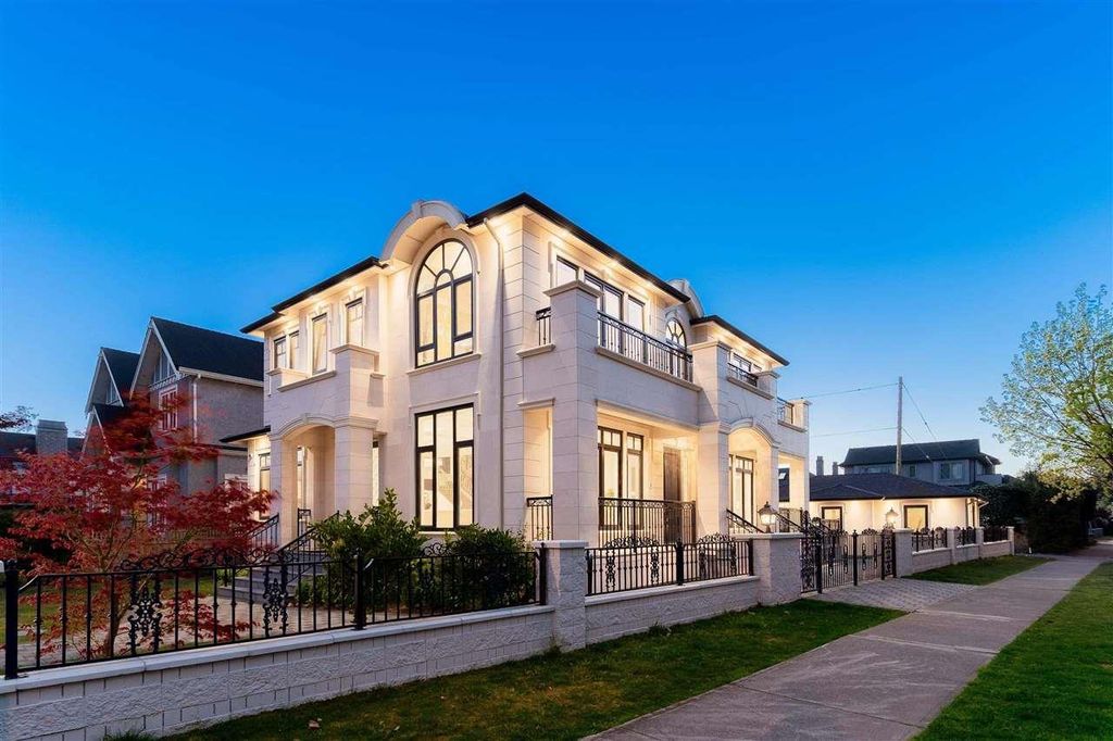 The Grande Vancouver House was designed by famous interior designers now available for sale. This home located at 2211 Mcmullen Ave, Vancouver, BC V6L 2E2, Canada