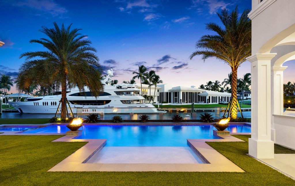 This Insanely Beautiful Boca Raton Villa was executed by J.P. DiMisa Luxury Homes, Inc. Perching in the most prestigious Royal Palm Yacht & Country Club, this 9,000 square foot home is a celebration of quality, design and superior craftsmanship