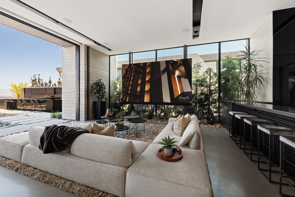 The Iconic Home in Henderson is is a multisensory experience designed to amplify the modern luxury at an unprecedented level now available for sale. This home located at 685 Dragon Peak Dr, Henderson, Nevada