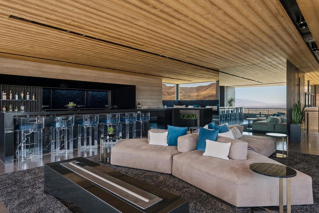 The Iconic Home in Henderson is is a multisensory experience designed to amplify the modern luxury at an unprecedented level now available for sale. This home located at 685 Dragon Peak Dr, Henderson, Nevada