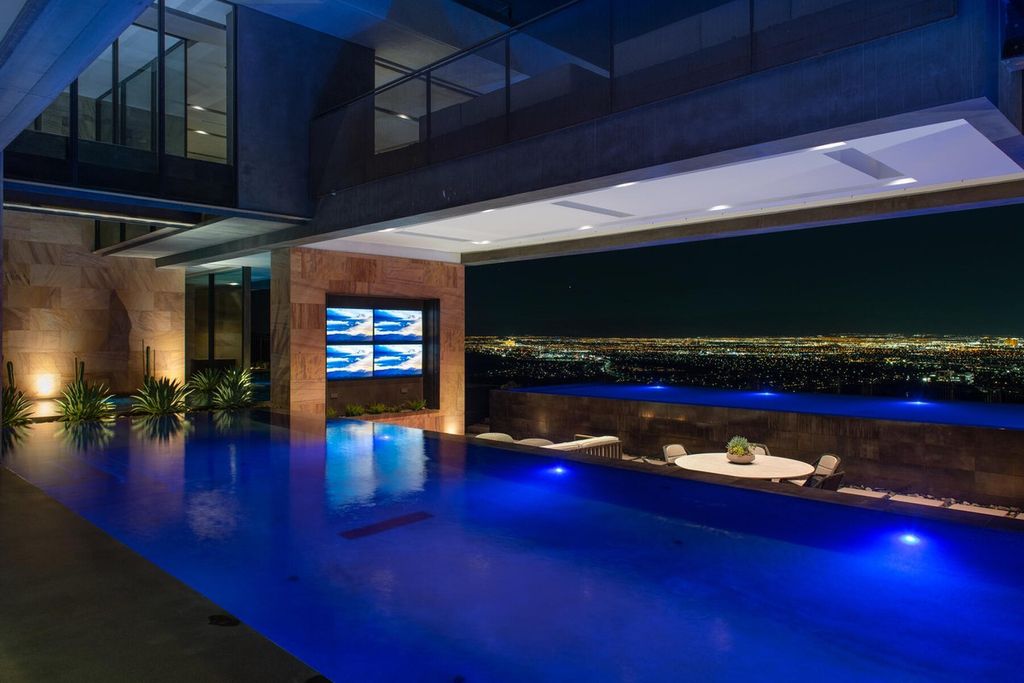 The Iconic Home in Henderson is is a multisensory experience designed to amplify the modern luxury at an unprecedented level now available for sale. This home located at 685 Dragon Peak Dr, Henderson, Nevada