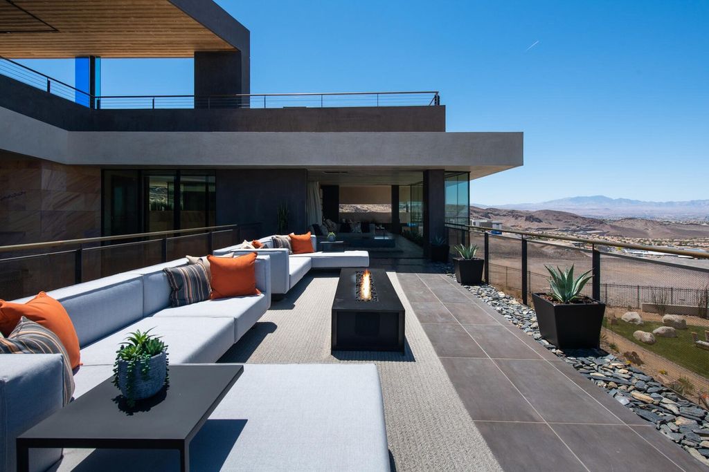 The Iconic Home in Henderson is is a multisensory experience designed to amplify the modern luxury at an unprecedented level now available for sale. This home located at 685 Dragon Peak Dr, Henderson, Nevada