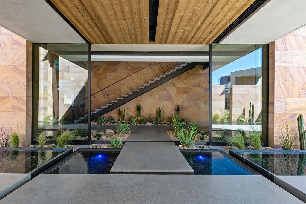 The Iconic Home in Henderson is is a multisensory experience designed to amplify the modern luxury at an unprecedented level now available for sale. This home located at 685 Dragon Peak Dr, Henderson, Nevada