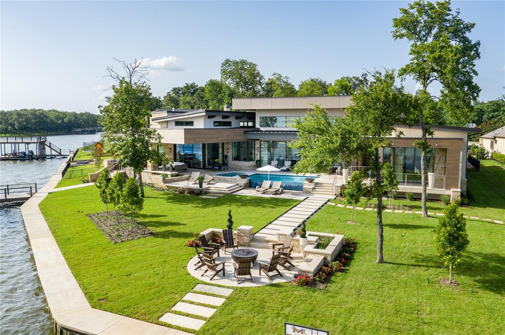 The Modern Smart Home in Texas is a luxurious home with wide view of the infinity pool and massive lake in in E. TX Golf Community now available for sale. This home located at 225 Sandpiper Dr, Mabank, Texas