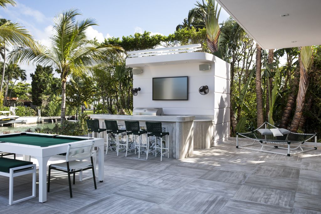 This Outstanding Luxury House in Miami Beach was built by the well-known Bart Reines Luxury HomeBuilder. Over 9000 sqft, 3 story villa on approximately 20,028 square feet, flat and southwest facing lot