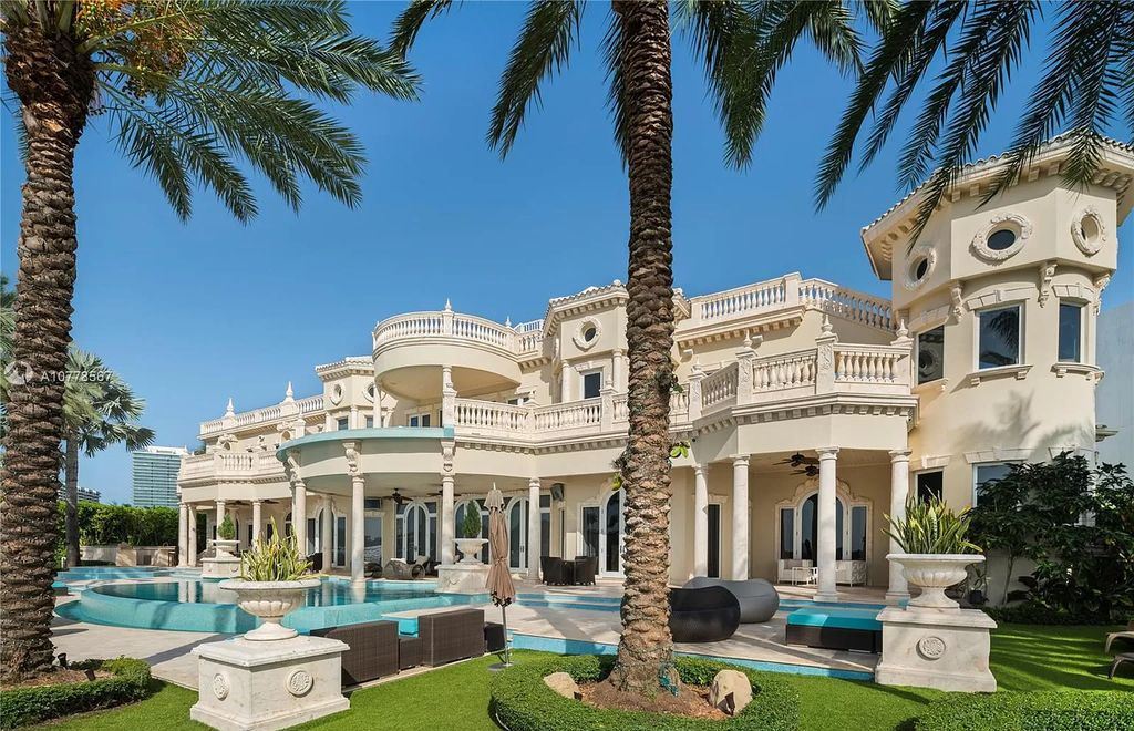 The Florida Mansion is a palatial estate is designed like no other with Absolutely unparalleled in finishes, appointments now available for sale. This home located at 182 Bal Bay Dr, Bal Harbour, Florida; offering 8 bedrooms and 11 bathrooms with over 12,000 square feet of living spaces.