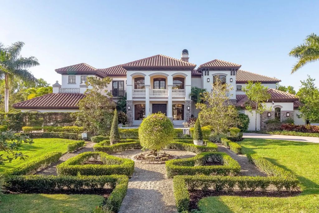 The Home in Parkland is a luxurious home with updates and Smart Home features, including a theater, custom wine cellar, saltwater pool now available for sale. This home located at 9136 NW 66th Ln, Parkland, Flordia; offering 7 bedrooms and 9 bathrooms with over 17,000 square feet of living spaces.