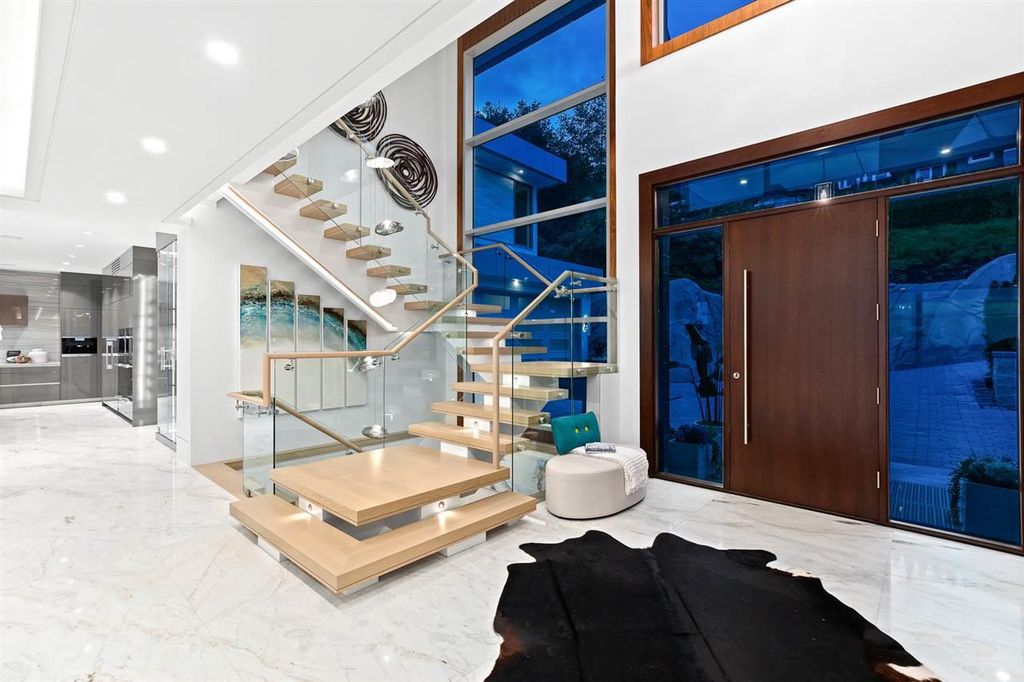 The Sumptuous West Vancouver Villa offers the absolute best panoramic view of Lion Gate Bridge, Downtown & Stanley Park now available for sale. This home located at 1430 Bramwell Rd, West Vancouver, BC V7S 2N9, Canada