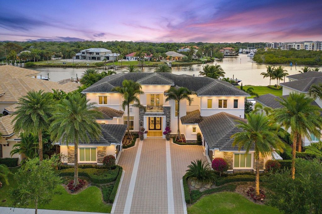 The Florida Home located directly on the Intracoastal, across from the wide water opening to Loggerhead Marina now available for sale. This home located at 13919 Chester Bay Ln, North Palm Beach, Florida