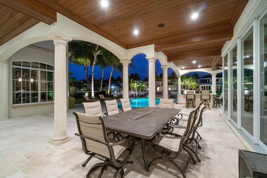The Boca Raton Home is a luxurious estate with fine custom details and one of a kind finishes featuring the most serene waterfront views now available for sale. This home located at 230 S Maya Palm Dr, Boca Raton, Florida; offering 5 bedrooms and 8 bathrooms with over 7,000 square feet of living spaces.