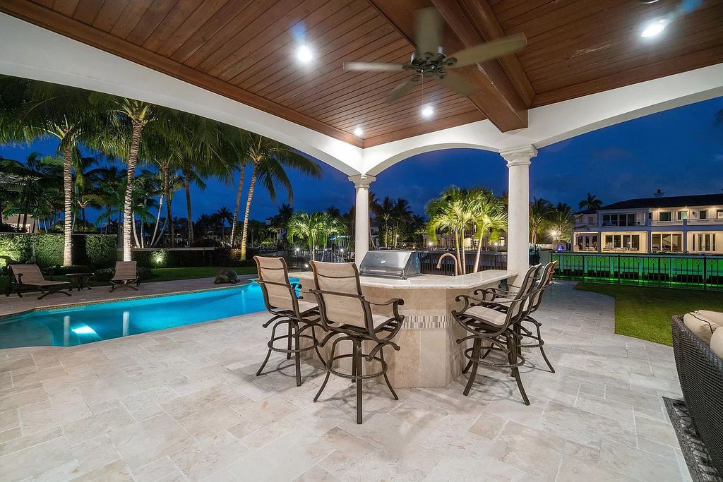 The Boca Raton Home is a luxurious estate with fine custom details and one of a kind finishes featuring the most serene waterfront views now available for sale. This home located at 230 S Maya Palm Dr, Boca Raton, Florida; offering 5 bedrooms and 8 bathrooms with over 7,000 square feet of living spaces.