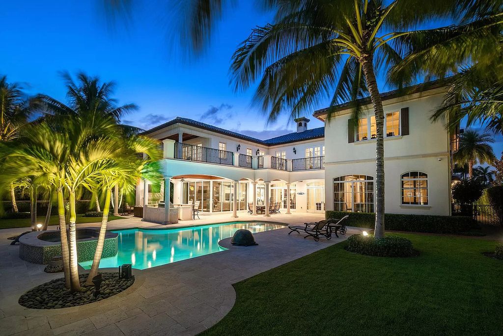 The Boca Raton Home is a luxurious estate with fine custom details and one of a kind finishes featuring the most serene waterfront views now available for sale. This home located at 230 S Maya Palm Dr, Boca Raton, Florida; offering 5 bedrooms and 8 bathrooms with over 7,000 square feet of living spaces.