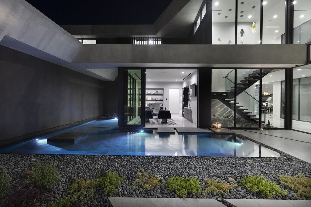 The Henderson Modern Home is a luxurious estate combining dramatic space and light with absolute sensation on incomparable grounds now available for sale. This home located at 681 Dragon Peak Dr, Henderson, Nevada