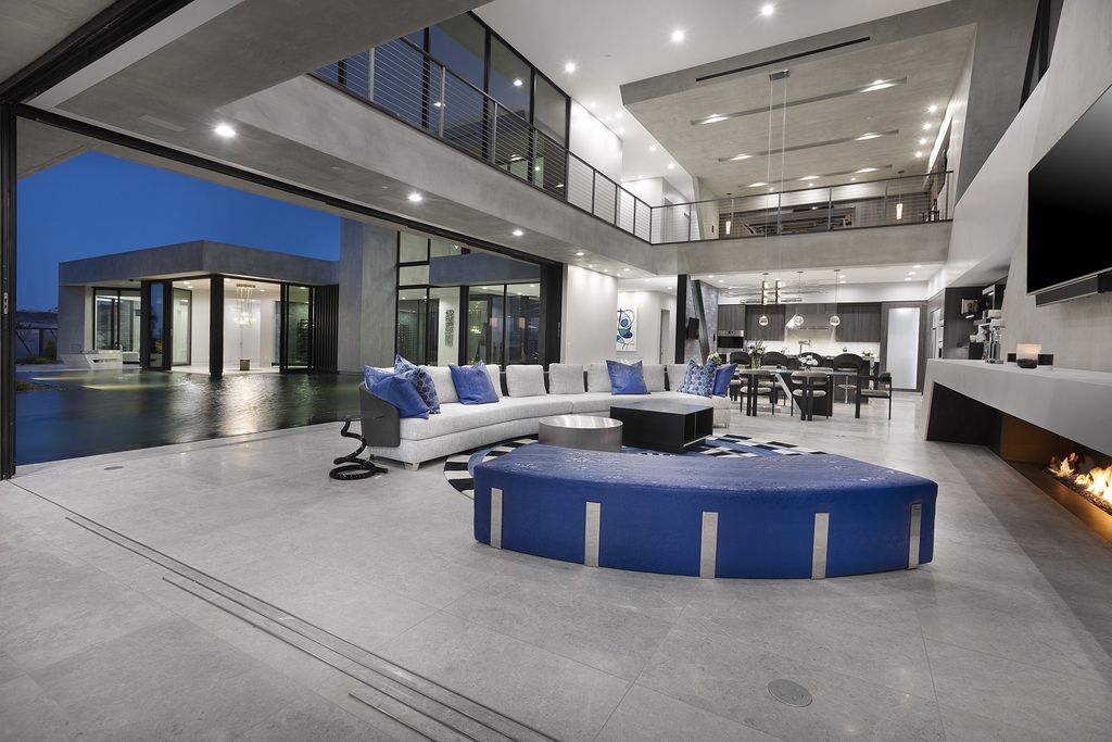 The Henderson Modern Home is a luxurious estate combining dramatic space and light with absolute sensation on incomparable grounds now available for sale. This home located at 681 Dragon Peak Dr, Henderson, Nevada