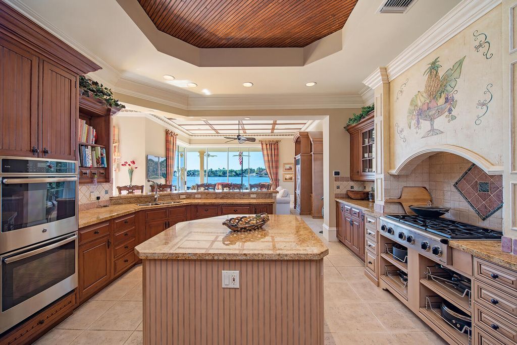 The Naples Home is a luxurious home on Treasure Cove offers expansive, long water views south over the waterway now available for sale. This home located at 696 Spyglass Ln, Naples, Florida; offering 6 bedrooms and 7 bathrooms with over 7,500 square feet of living spaces.