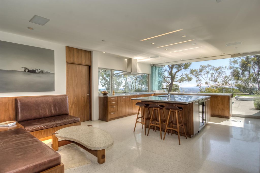The Beverly Hills Home set atop a promontory with total privacy & unobstructed views from downtown to the ocean now available for sale. This home located at 1133 Miradero Rd, Beverly Hills, California