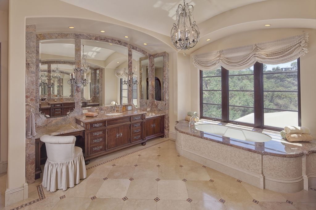 The Beverly Hills Mansion is an exquisite European Villa located within the prestigious guard-gated enclave of Beverly Ridge Estates now available for sale. This home located at 7 Beverly Ridge Ter, Beverly Hills, California; offering 6 bedrooms and 8 bathrooms with over 12,500 square feet of living spaces.