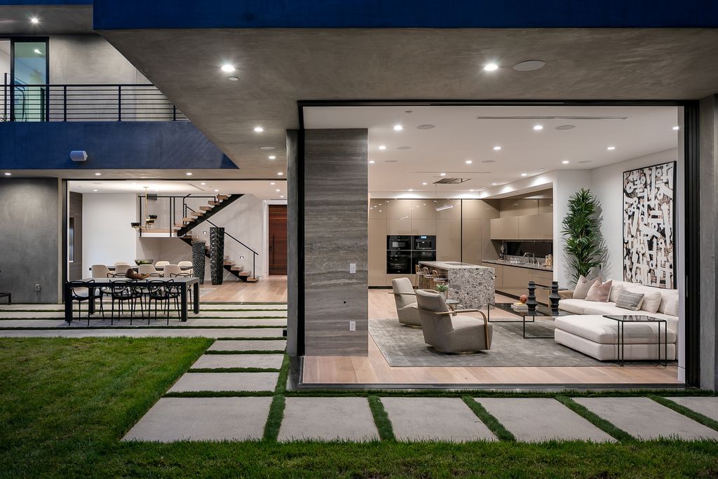 The Modern Home in Los Angeles is an exquisite warn new construction residence offers an array of earthy elements now available for sale. This home located at 5554 Green Oak Dr, Los Angeles, California