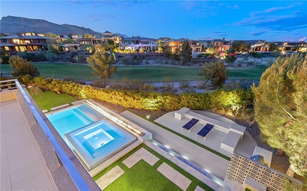 The Las Vegas Home is a luxurious estate features breathtaking views of the 8th fairway at Bears Best golf course and the mountains available for sale. This home located at 90 Meadowhawk Ln, Las Vegas, Nevada; offering 4 bedrooms and 6 bathrooms with over 6,000 square feet of living spaces.