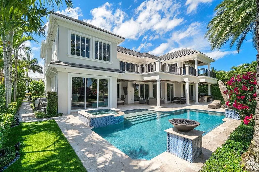 The Boca Raton Home is a luxurious estate offers an unprecedented perspective on resort-style golf course living now available for sale. This home located at 1300 Thatch Palm Dr, Boca Raton, Florida; offering 4 bedrooms and 6 bathrooms with over 6,000 square feet of living spaces.