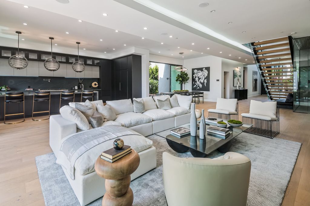 The Home in Los Angeles is brand new construction modern property with a roof-top entertainers deck is nothing short of spectacular now available for sale. This home located at 833 N Spaulding Ave, Los Angeles, California