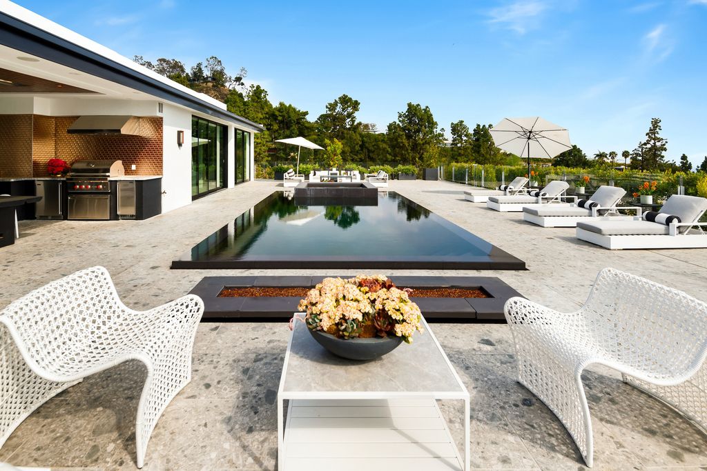 The Beverly Hills Home is a world class Trousdale Estates compound designed to elevate the art of living and entertaining now available for sale. This home located at 535 Chalette Dr, Beverly Hills, California
