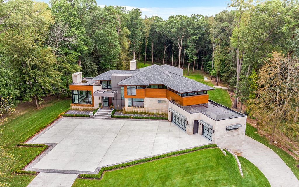 The Home in Michigan is a Marvelous Custom Contemporary designed by AZD Architects offers the utmost unique contemporary elegance now available for sale. This home located at 3777 Orion Rd, Oakland, Michigan