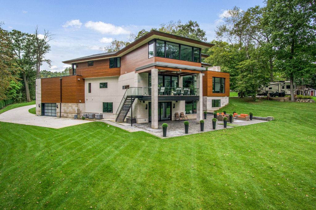 The Home in Michigan is a Marvelous Custom Contemporary designed by AZD Architects offers the utmost unique contemporary elegance now available for sale. This home located at 3777 Orion Rd, Oakland, Michigan