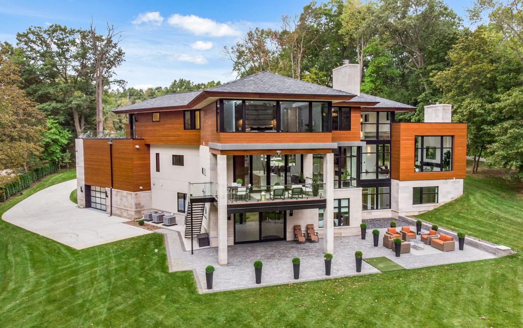 The Home in Michigan is a Marvelous Custom Contemporary designed by AZD Architects offers the utmost unique contemporary elegance now available for sale. This home located at 3777 Orion Rd, Oakland, Michigan