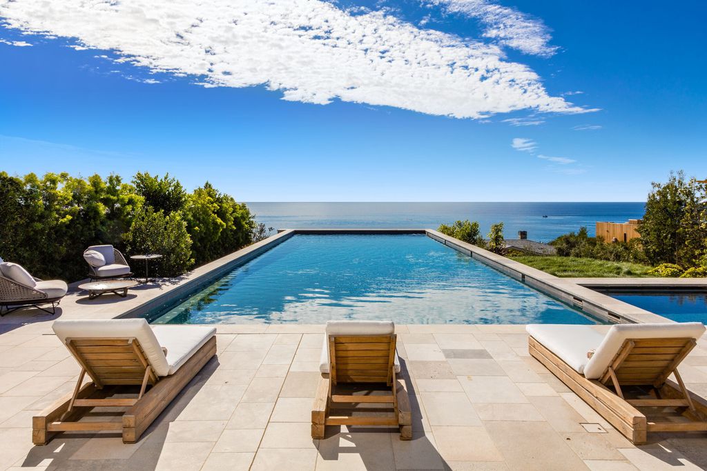 The Retreat in Malibu is a newly-constructed gated and private bluff-top property with panoramic ocean views now available for sale. This home located at 33740 Pacific Coast Hwy, Malibu, California