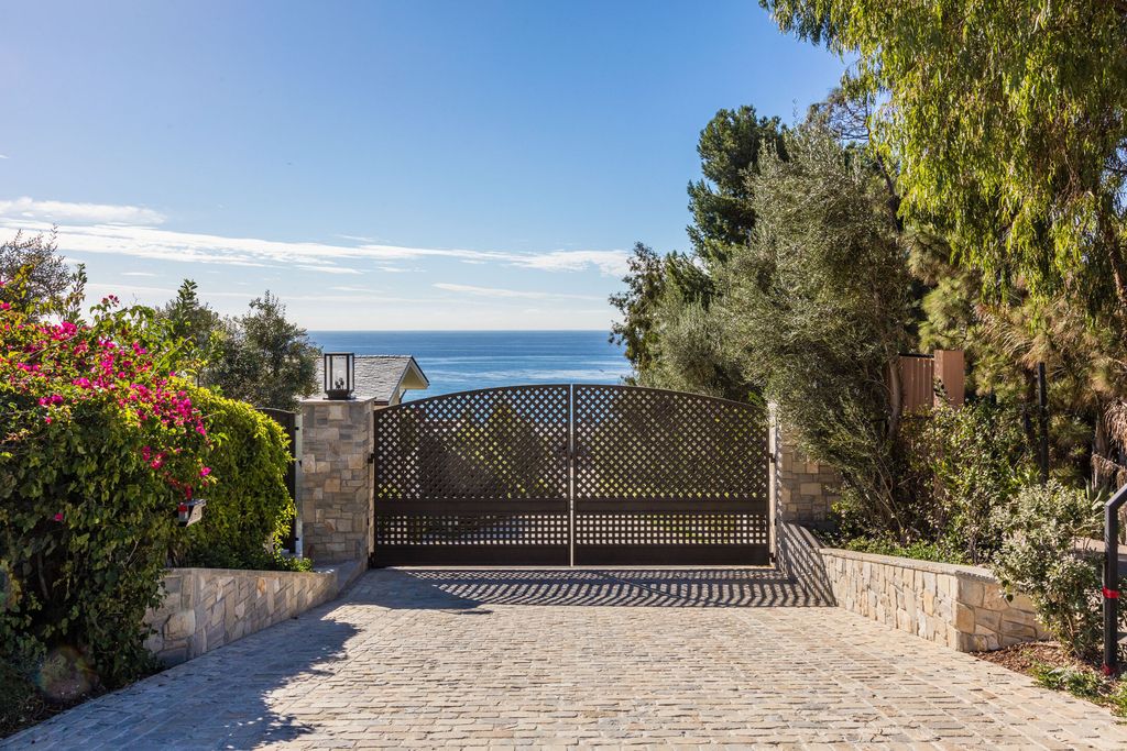 The Retreat in Malibu is a newly-constructed gated and private bluff-top property with panoramic ocean views now available for sale. This home located at 33740 Pacific Coast Hwy, Malibu, California