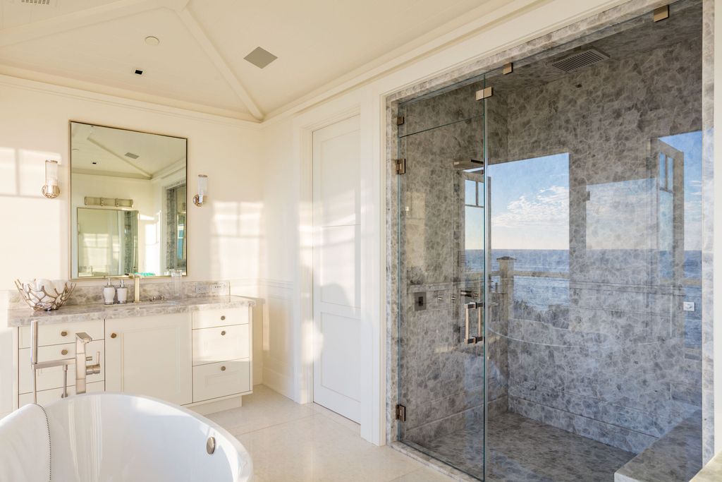 The Retreat in Malibu is a newly-constructed gated and private bluff-top property with panoramic ocean views now available for sale. This home located at 33740 Pacific Coast Hwy, Malibu, California