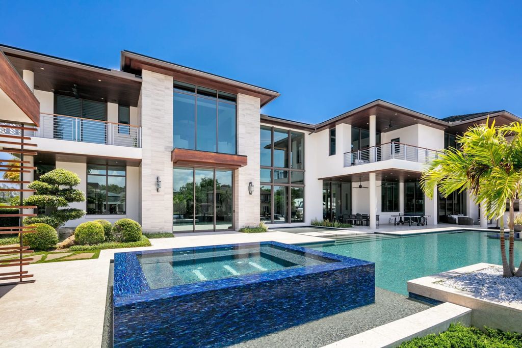 The Fort Lauderdale Home is a stunning estate nestled in the exclusive Bay Colony community perfect for entertaining now available for sale. This home located at 20 Compass Is, Fort Lauderdale, Florida