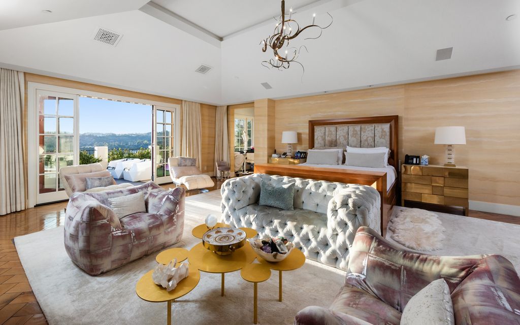 The Beverly Hills Mansion is a World class compound with stunning panoramic views set in guard gated Bella Vista Estates now available for sale. This home located at 2505 Summitridge Dr, Beverly Hills, California