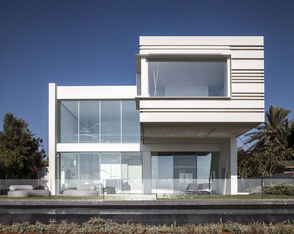 A House by The Sea Features Stripy Aluminium Walls by Pitsou Kedem