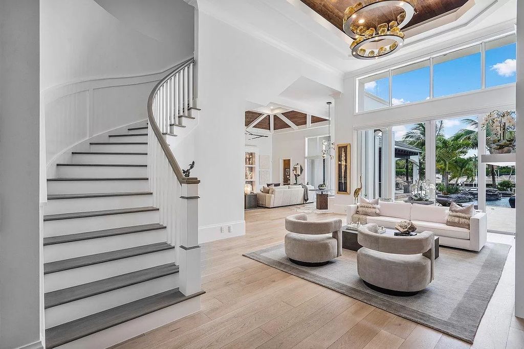 The Waterfront Home in North Palm Beach is a luxurious estate situated in gated Captains Key Community great for entertaining  now available for sale. This home located at 12014 Captains Lndg, North Palm Beach, Florida