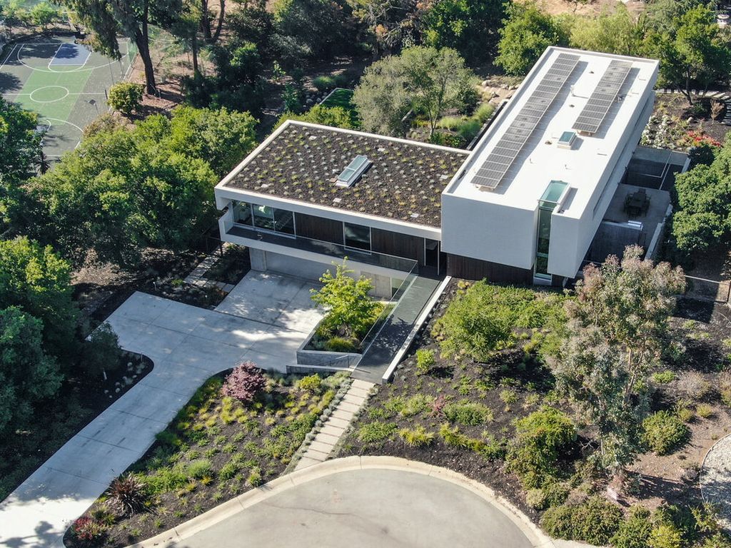 The Architectural Home in Los Altos on one acre is sleek and contemporary built of formed concrete, glass and designed for eco-friendly living now available for sale. This home located at 25755 Carado Ct, Los Altos, California